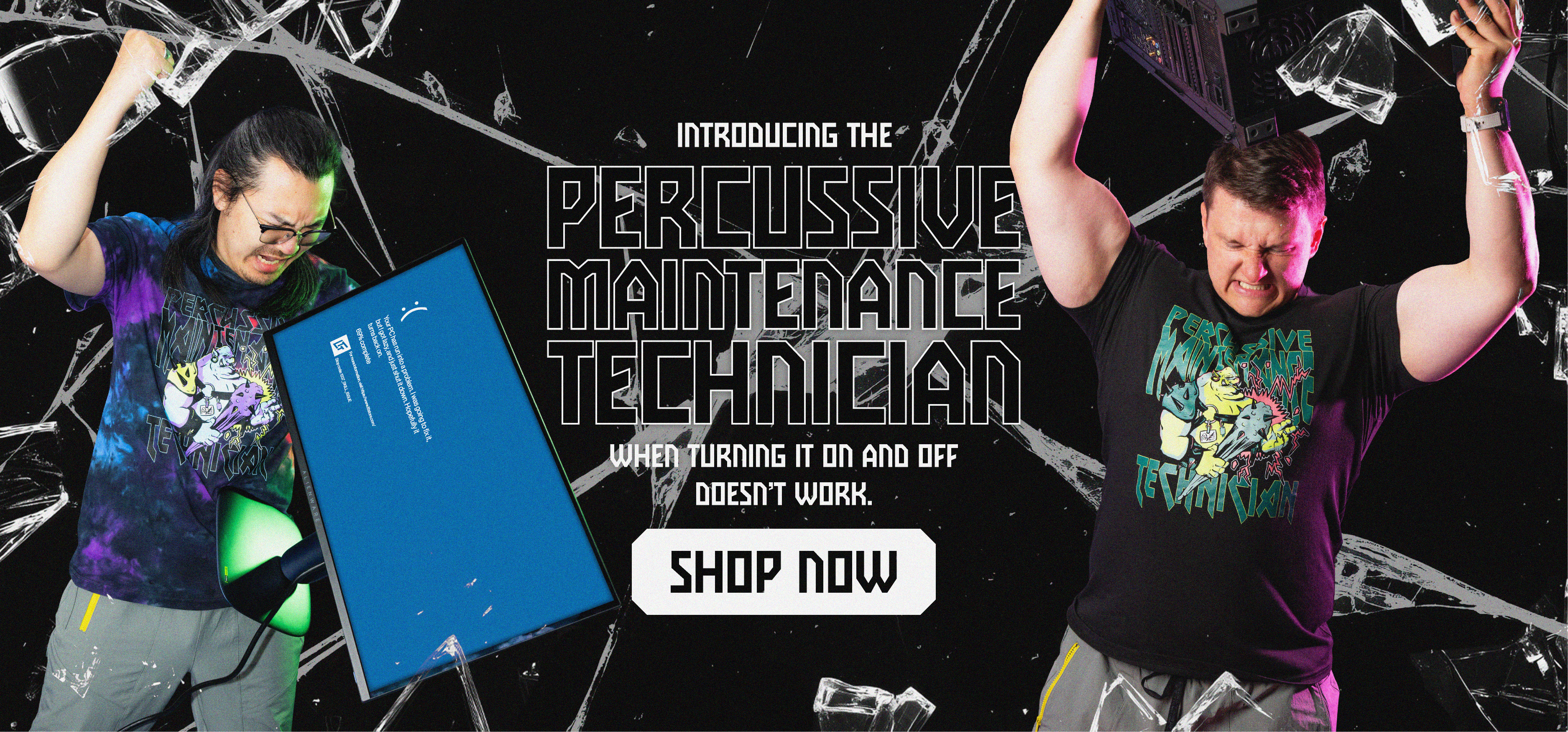 Promotional banner featuring two people humorously hitting computer equipment while wearing the Percussive Maintenance Technician T-shirt, with a Shop Now call to action.